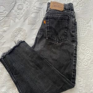 Faded black 90s orange tab 912 Levi’s. Slim fit, cropped leg, genuine vintage